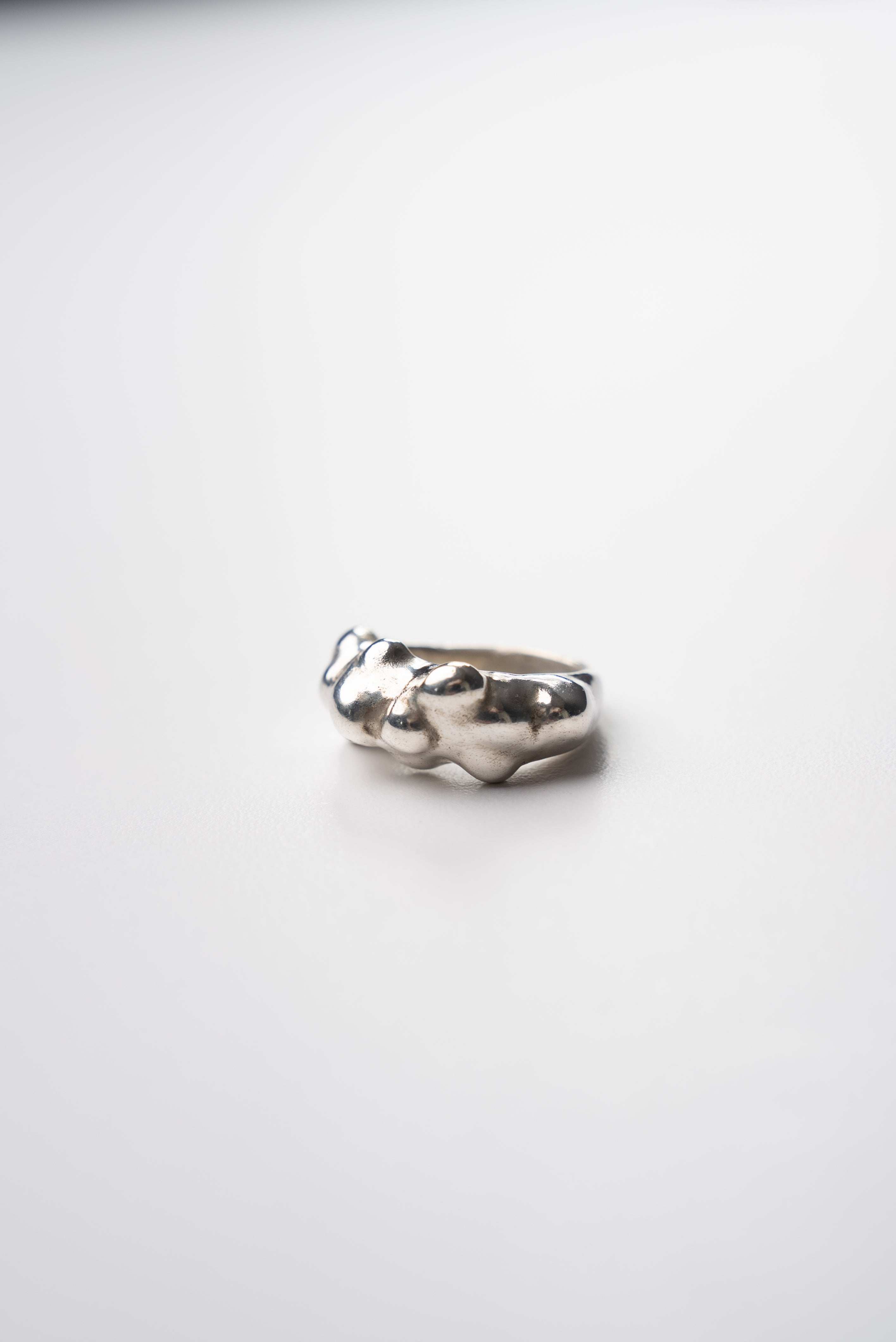 Silver ring on a white background